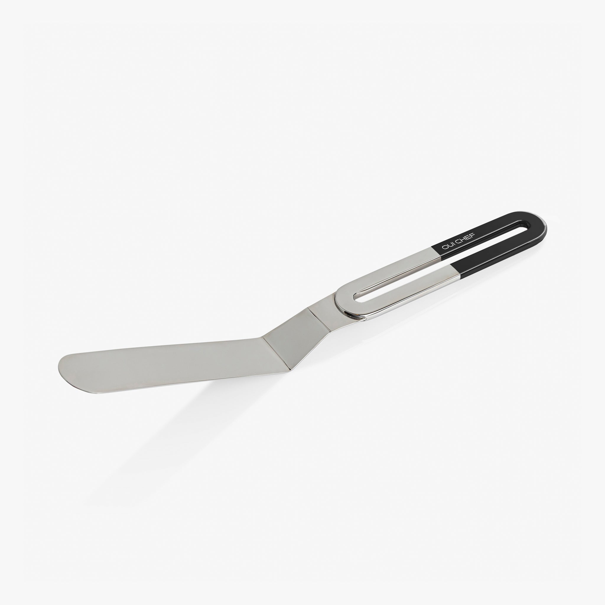Stainless steel large palette knife with a gloss black top handle sitting against a white background.