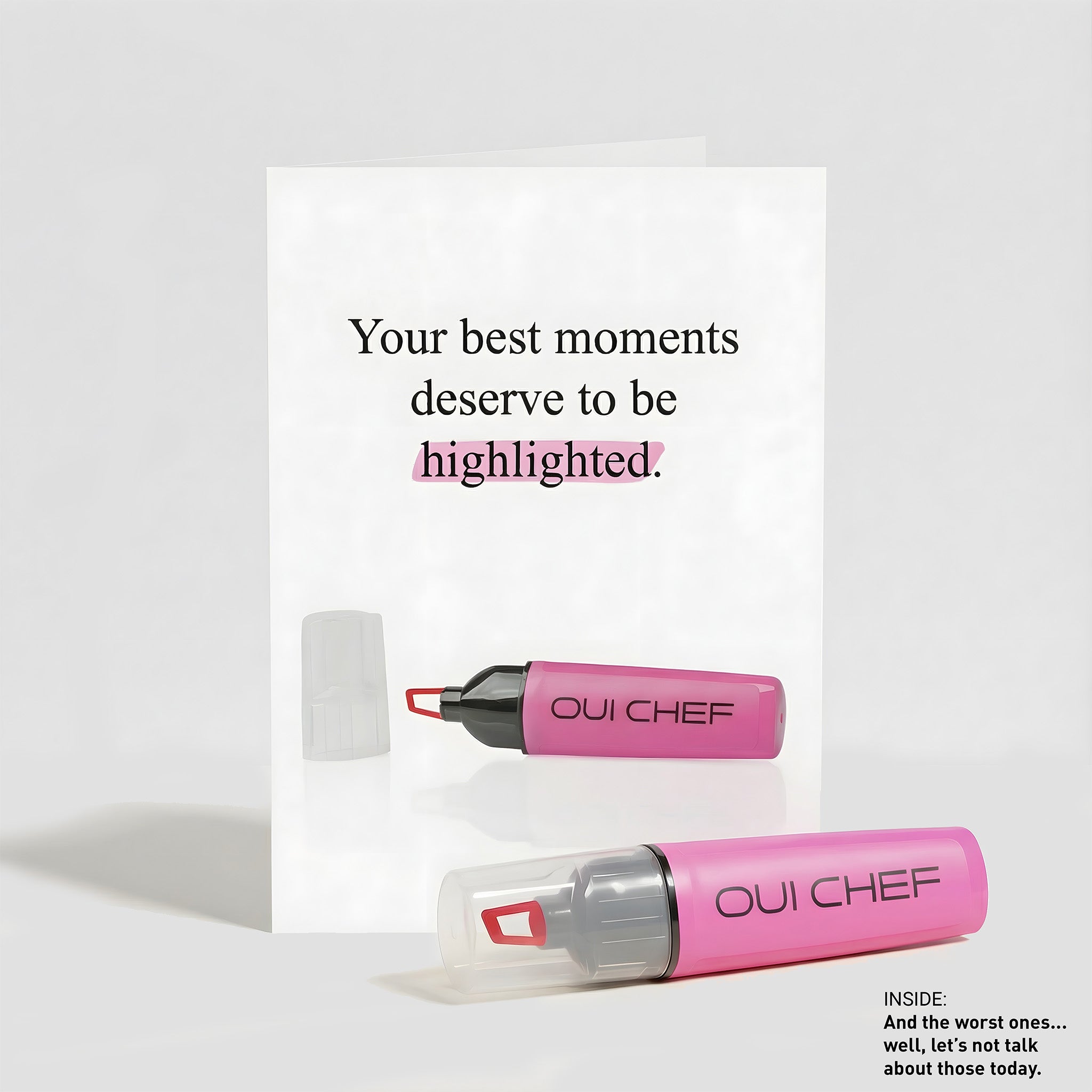 Oui Chef "Highlight The Moments" Greeting card standing against a white background with a sharpie placed beside it.