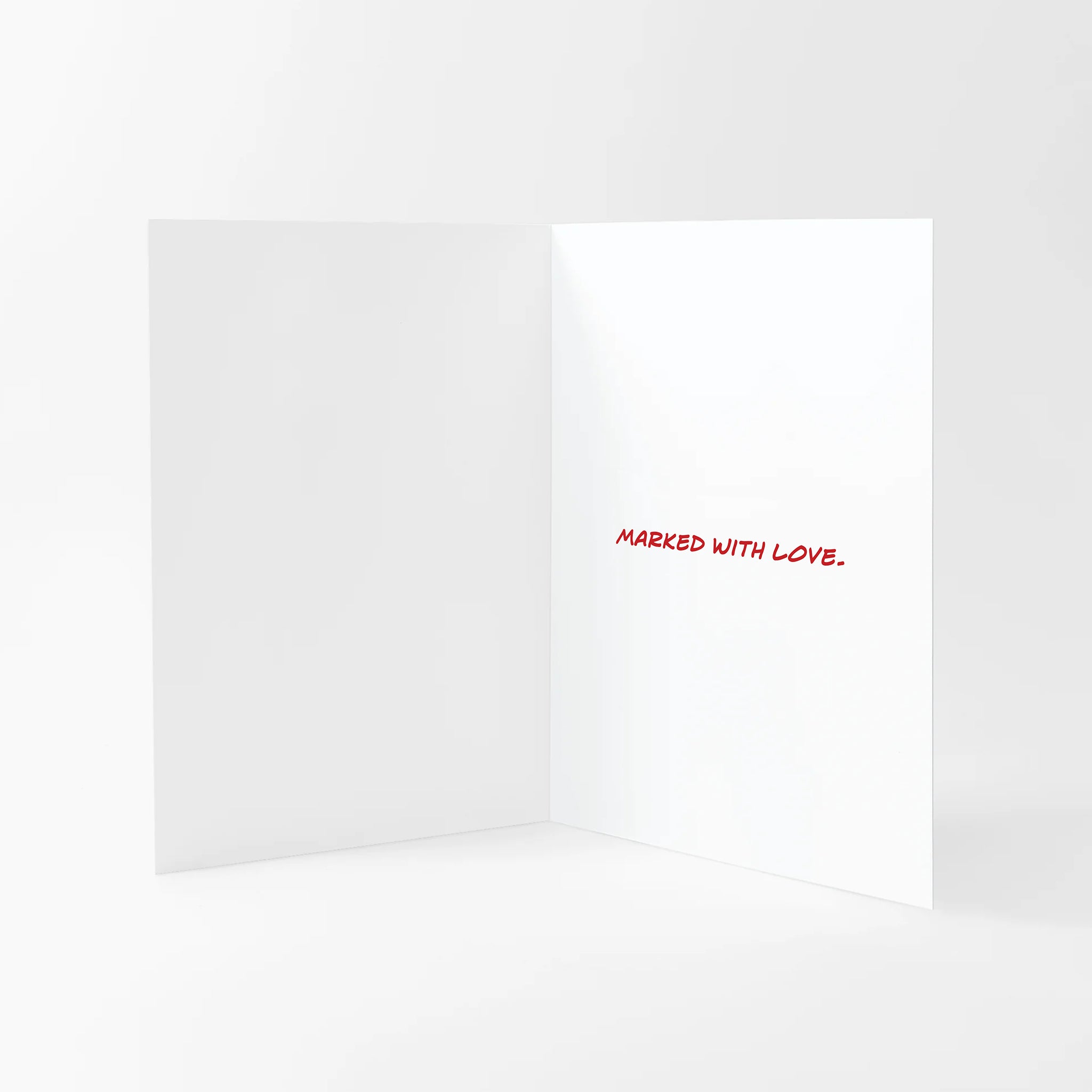 Valentines card with 'Marked With Love' text on the inside against a white background.