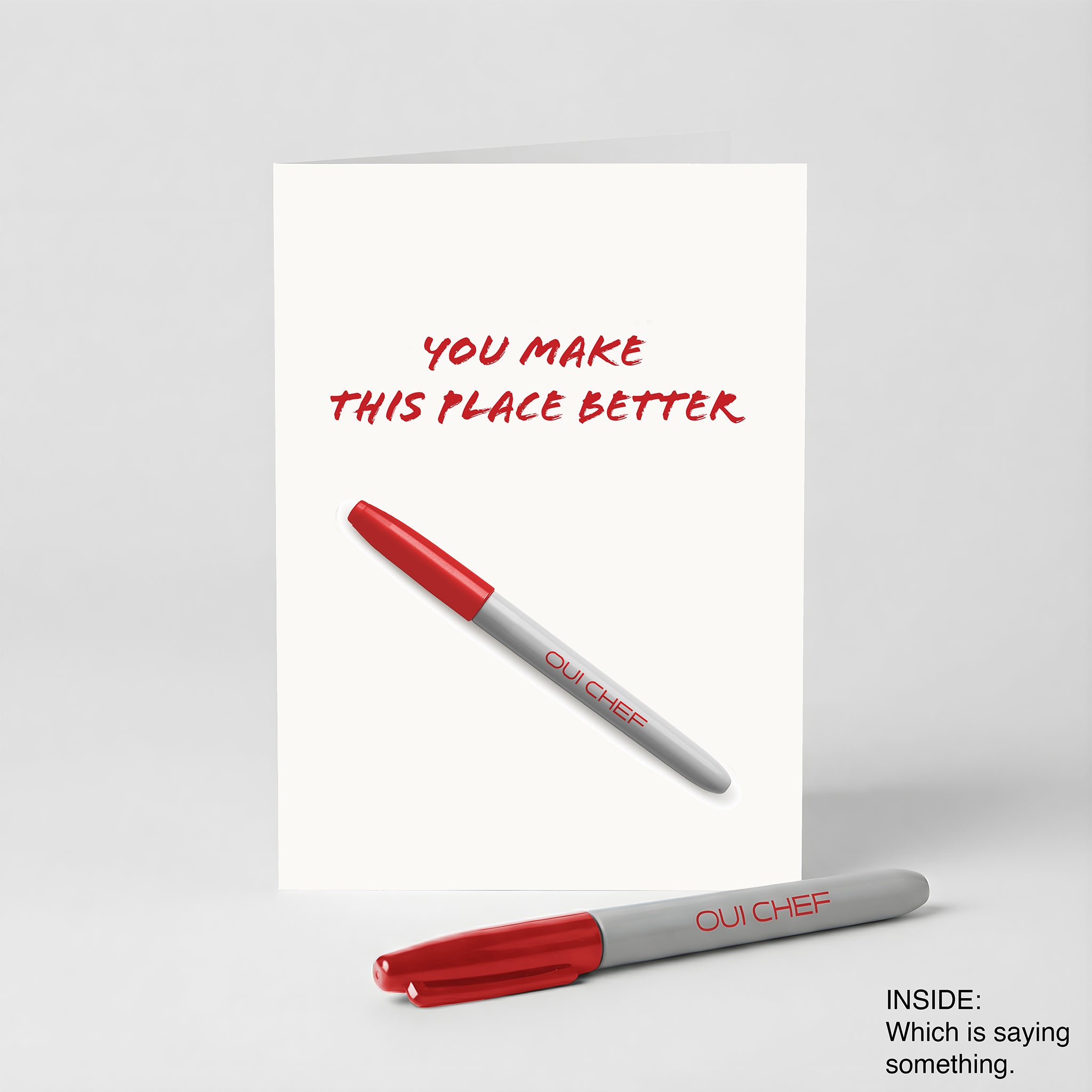 Valentines card with 'You Make This Place Better' text and a red Sharpie on a white background.